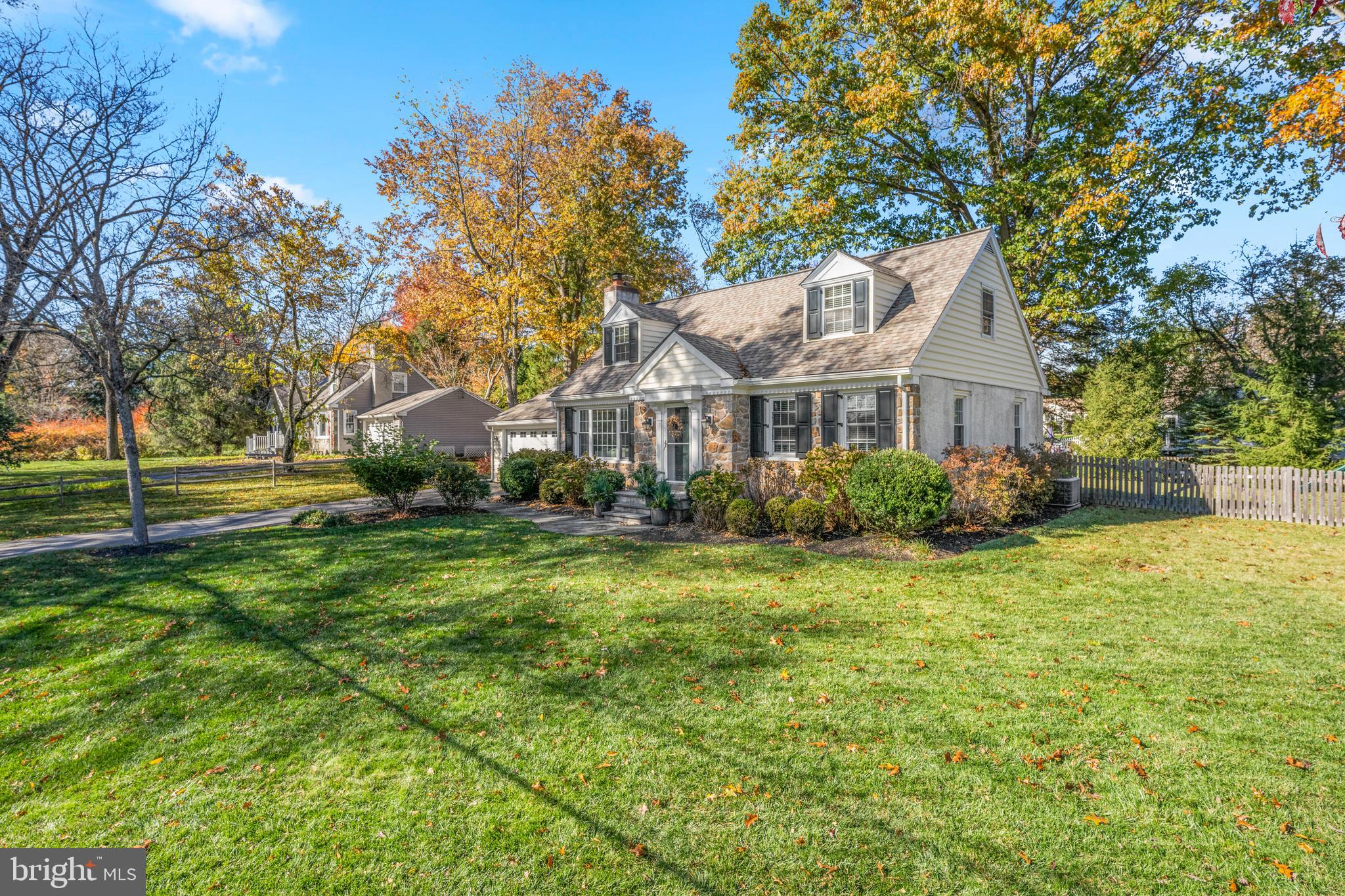 124 Deepdale Road Wayne, PA 19087 - Photo 2 of 35 a front view of a house with a yard