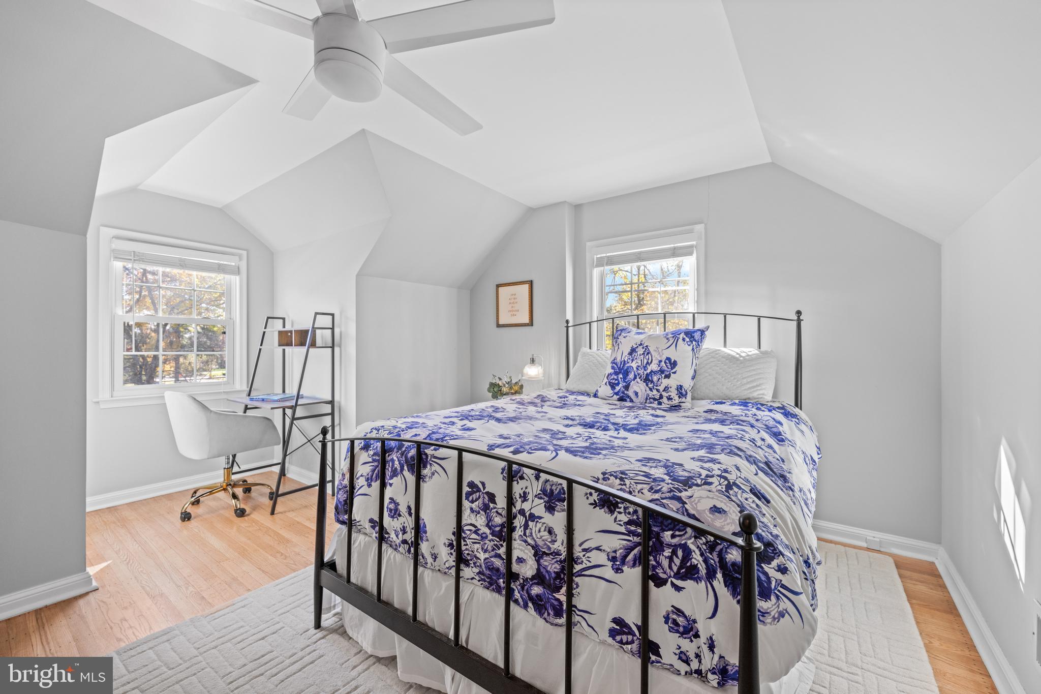 124 Deepdale Road Wayne, PA 19087 - Photo 27 of 35 a bedroom with a bed and wooden floor