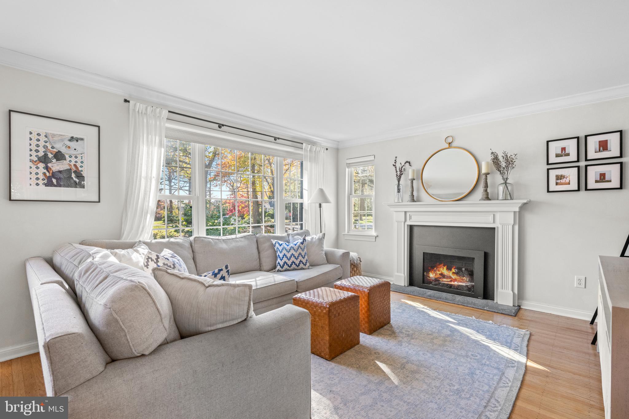 124 Deepdale Road Wayne, PA 19087 - Photo 7 of 35 a living room with furniture and a fireplace