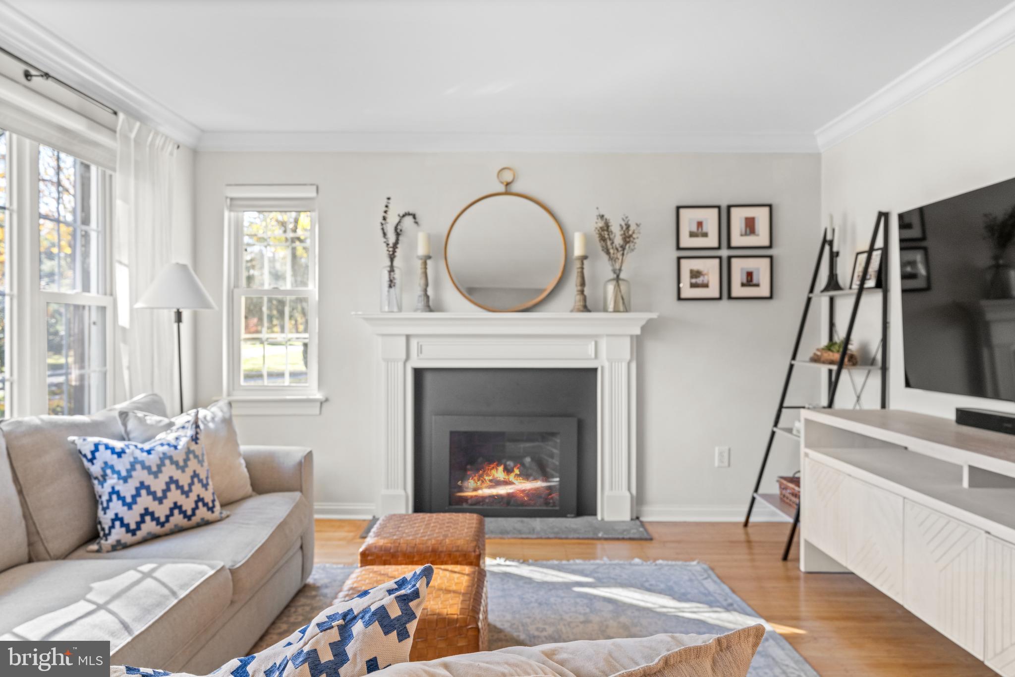 124 Deepdale Road Wayne, PA 19087 - Photo 9 of 35 a living room with furniture and a fireplace
