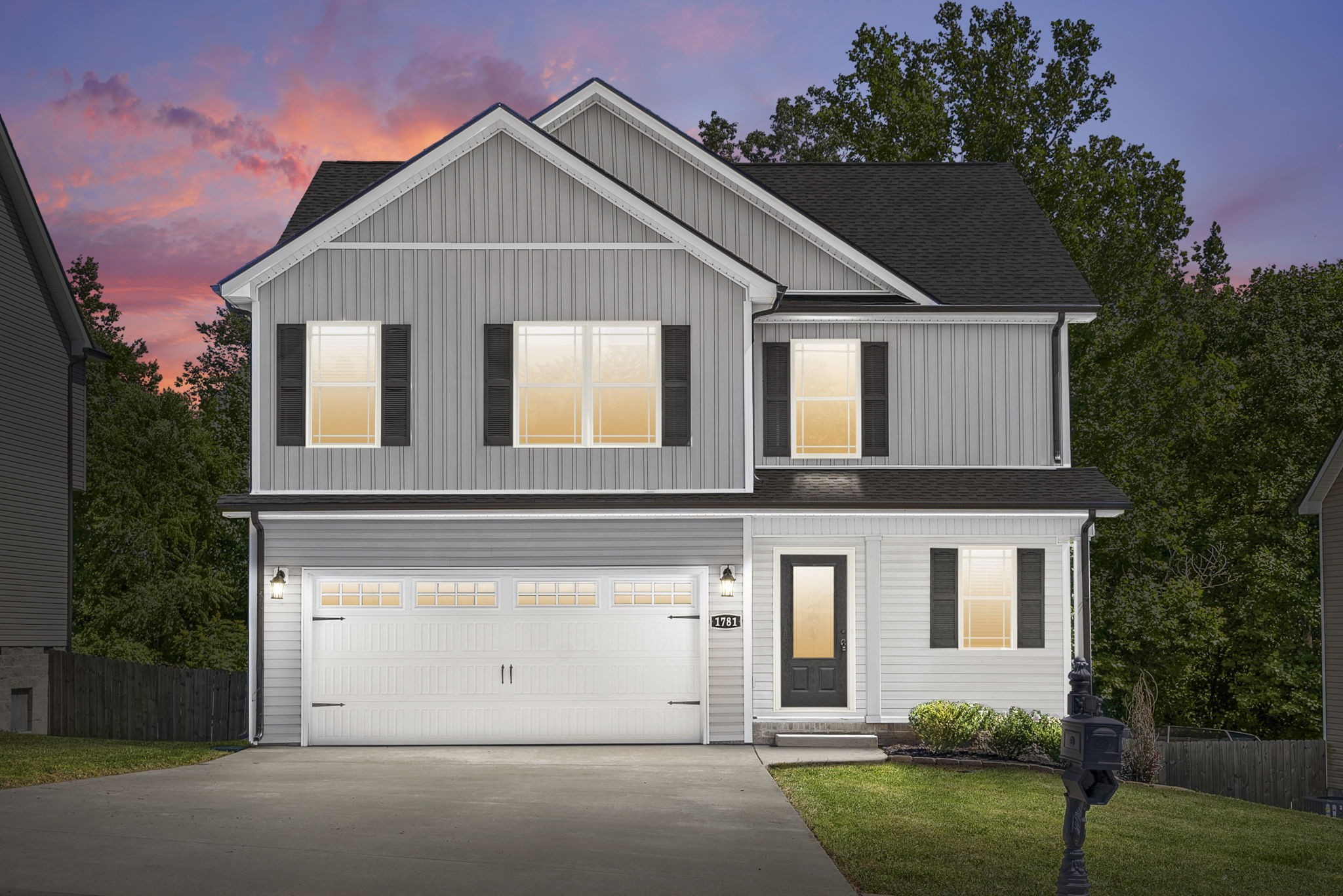 a front view of a house with a yard