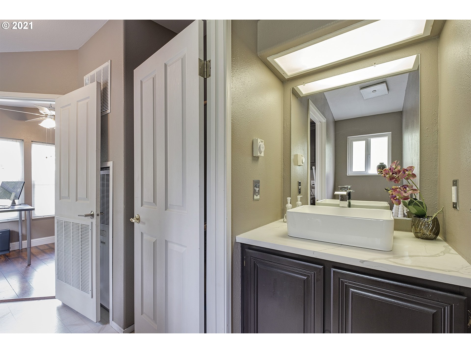 4300 Mapleton Drive West Linn, OR 97068 - Photo 16 of 32 a bathroom with a sink and a mirror