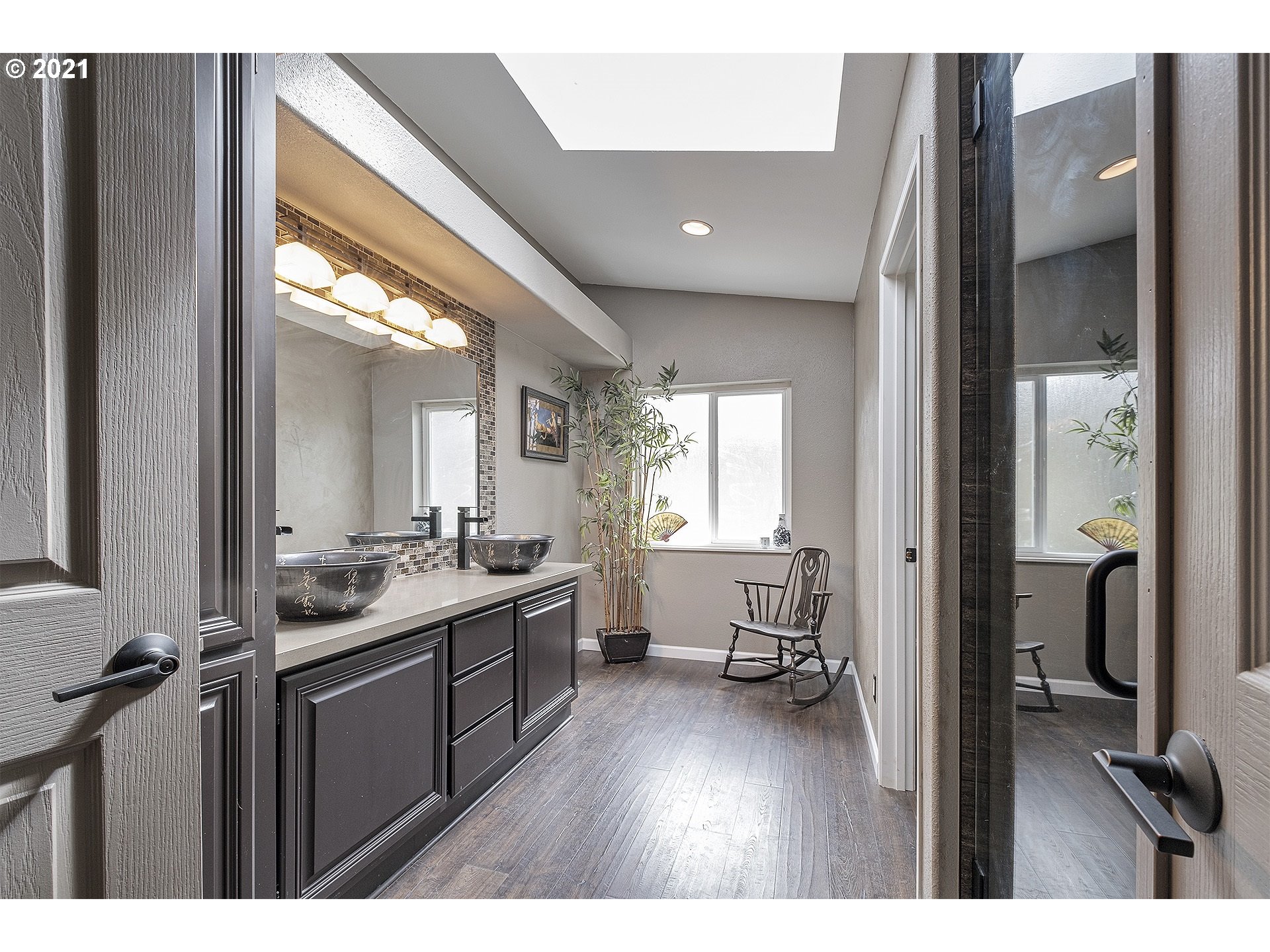 4300 Mapleton Drive West Linn, OR 97068 - Photo 19 of 32 a kitchen with a sink and wooden floor