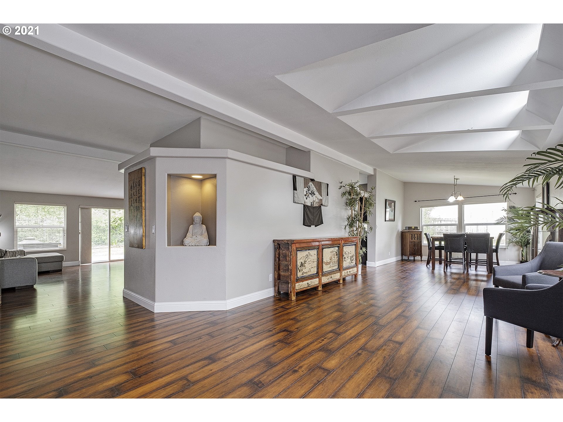 4300 Mapleton Drive West Linn, OR 97068 - Photo 3 of 32 a view of a livingroom with furniture and wooden floor