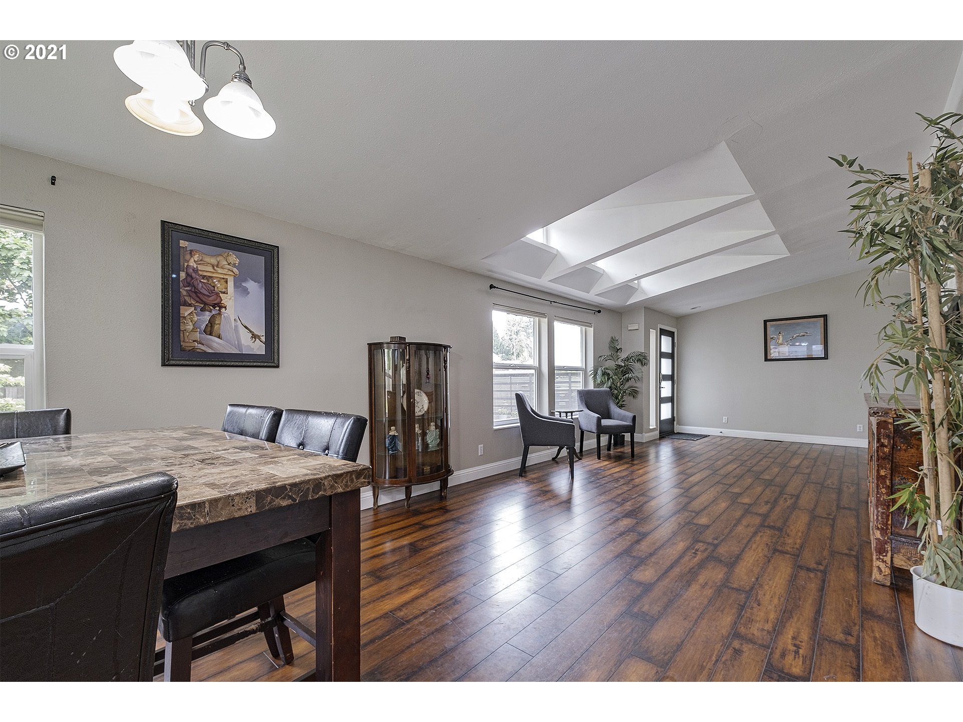 4300 Mapleton Drive West Linn, OR 97068 - Photo 5 of 32 a view of a dining room with furniture and wooden floor
