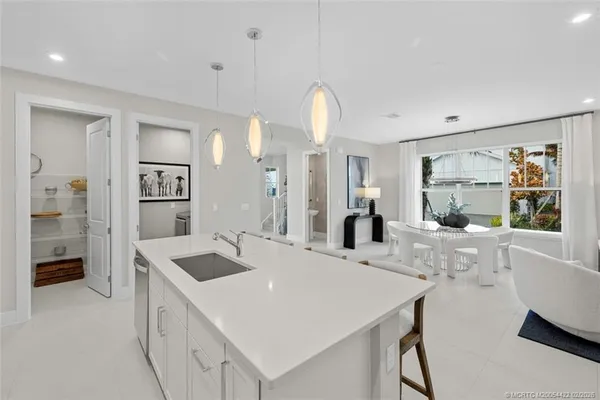 a view of a stove and cabinets