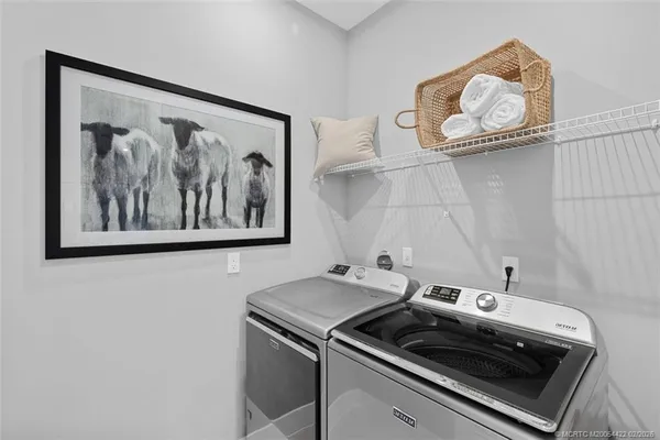 a view of living room with granite countertop furniture and fireplace