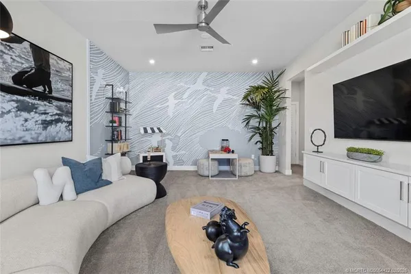 a bed room with a bed and a tv