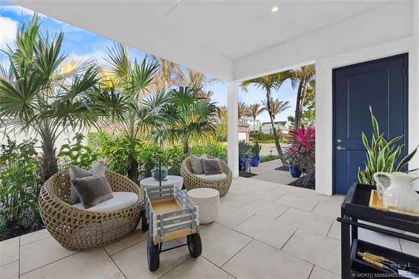 a view of a kitchen with a sink and a faucet
