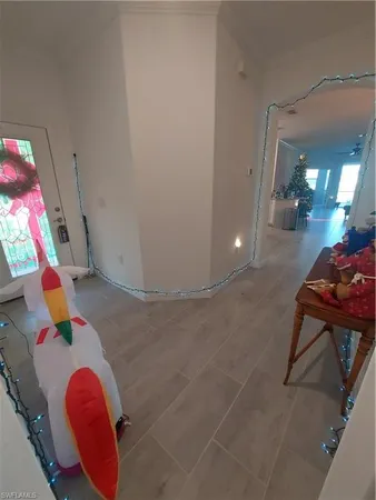a room with toys and stairs