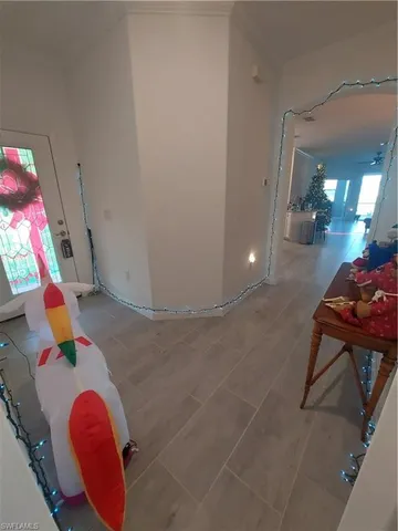 a room with toys and stairs