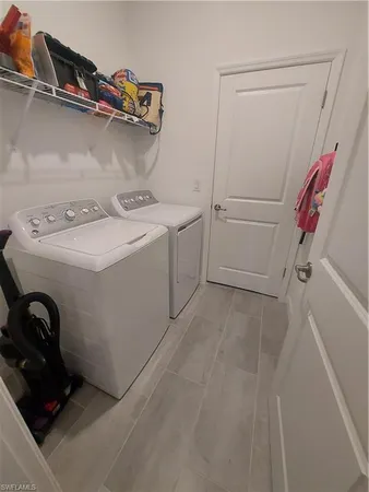 a view of a large body of water with a building in the background