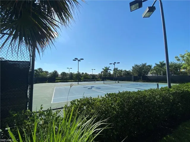 a view of a balcony with wooden floor and city view