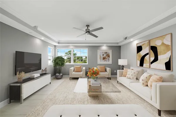 a living room with furniture and a flat screen tv