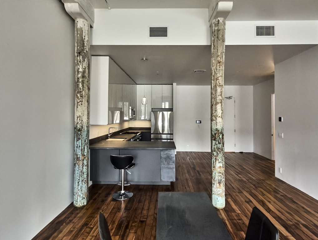 520 State Road, Unit 205 North Adams, MA 01247 - Photo 11 of 20 a view of kitchen with sink microwave and refrigerator