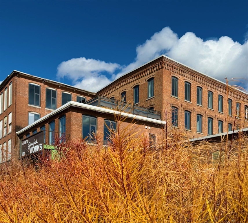 520 State Road, Unit 205 North Adams, MA 01247 - Photo 19 of 20 a front view of a house with a yard