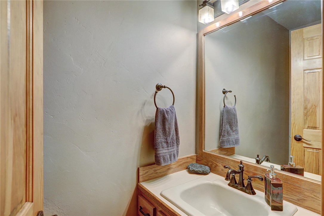385 Riverside Drive Silverthorne, CO 80498 - Photo 11 of 35 Half bath on the main level just off the entryway.