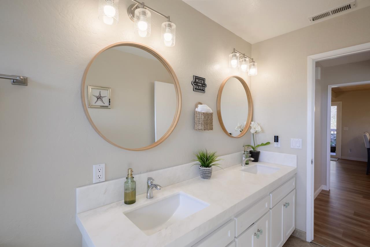 155 Rabbits Run Road Santa Cruz, CA 95060 - Photo 48 of 113 a bathroom with a sink and a mirror