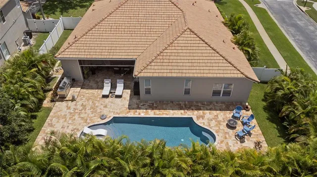 a view of a house with swimming pool