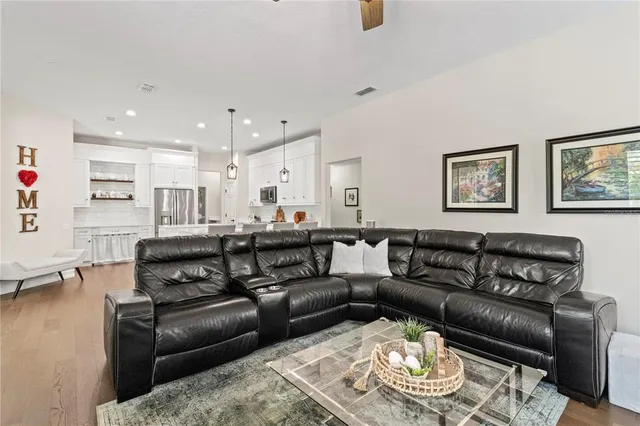 a living room with furniture and a couch