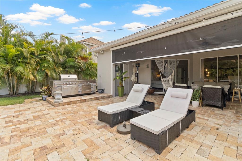11208 Ledgement Lane Windermere, FL 34786 - Photo 32 of 36 a view of the patio with couches and pool