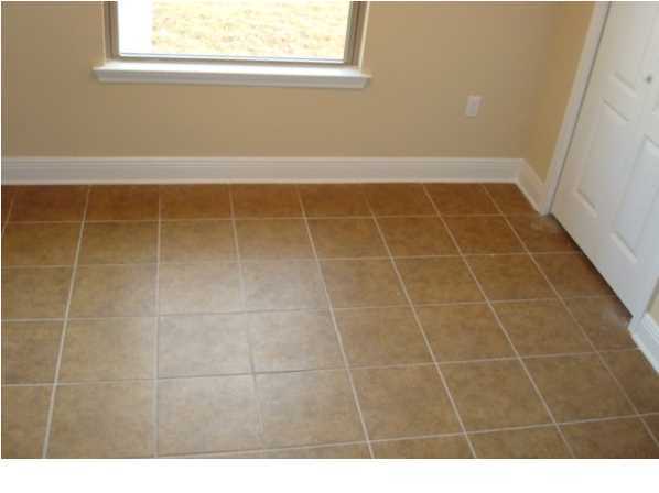 5608 Price Plantation Road Baker, FL 32531 - Photo 11 of 34 a bathroom with a window and a shower