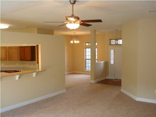 5608 Price Plantation Road Baker, FL 32531 - Photo 3 of 34 a view of a livingroom with a chandelier fan