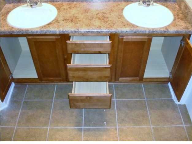 5608 Price Plantation Road Baker, FL 32531 - Photo 25 of 34 a bathroom with a sink a mirror and a shower