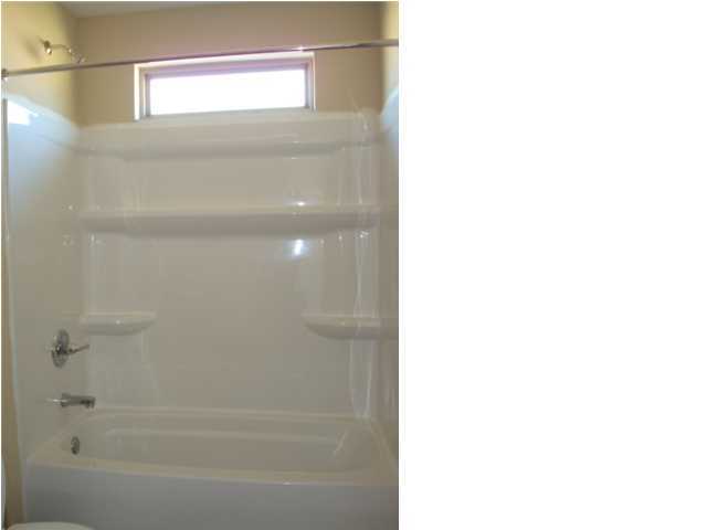 5608 Price Plantation Road Baker, FL 32531 - Photo 29 of 34 a bathroom with a shower
