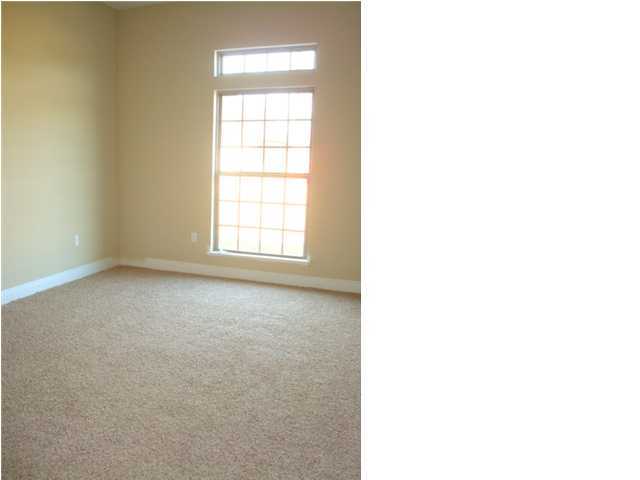5608 Price Plantation Road Baker, FL 32531 - Photo 31 of 34 a view of an empty room with a window