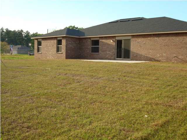 5608 Price Plantation Road Baker, FL 32531 - Photo 34 of 34 a front view of house with yard