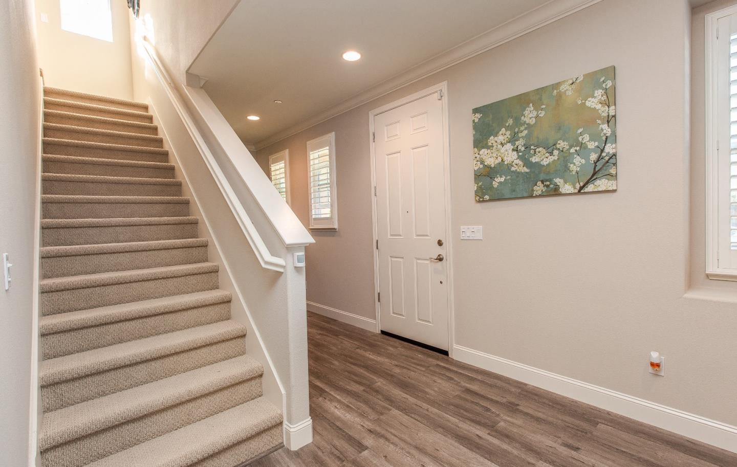 104 Caspian Way Gilroy, CA 95020 - Photo 14 of 33 a view of entryway with wooden floor