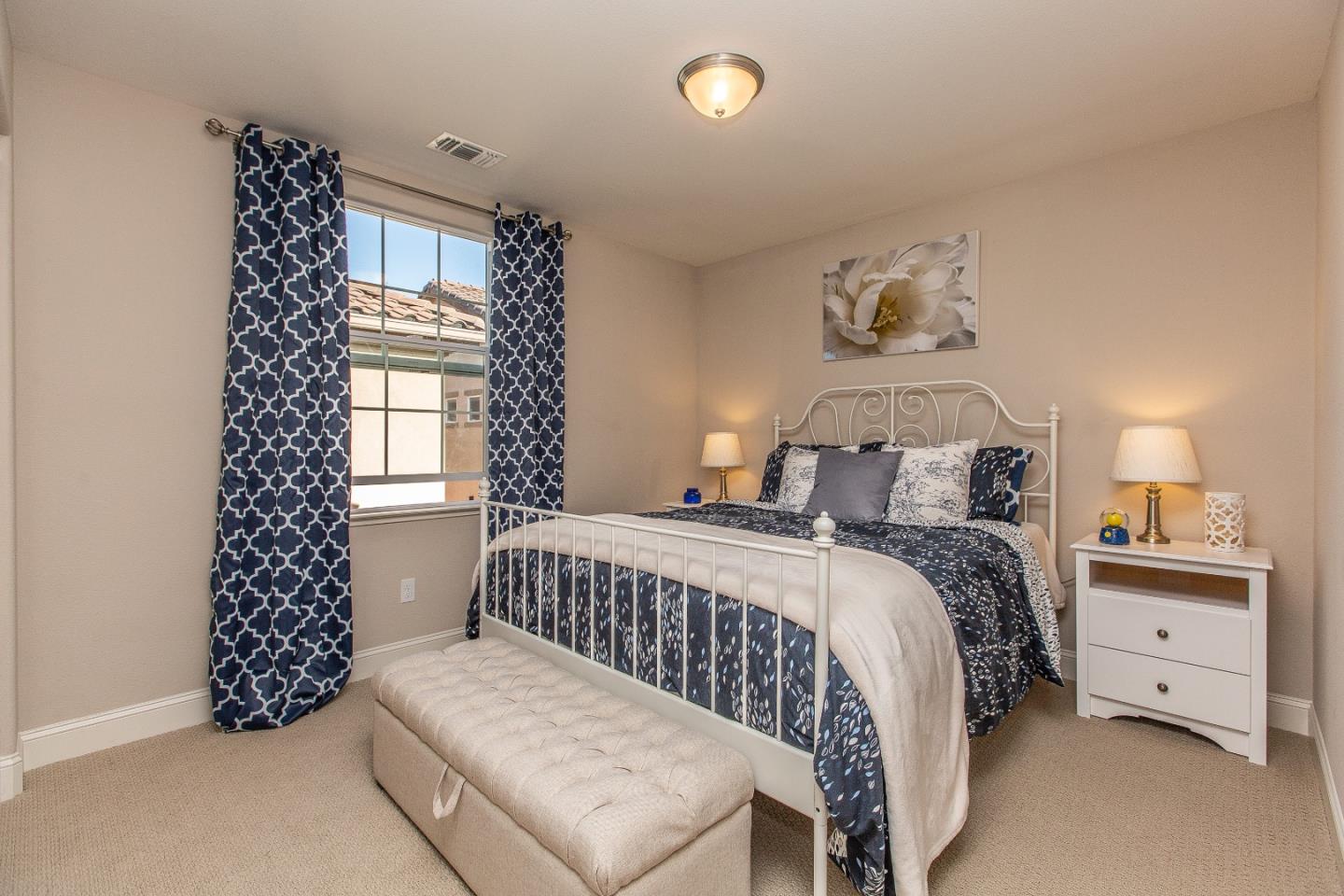 104 Caspian Way Gilroy, CA 95020 - Photo 22 of 33 a bedroom with a bed and a window