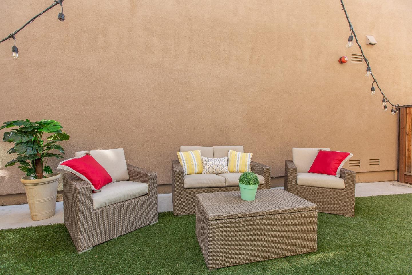 104 Caspian Way Gilroy, CA 95020 - Photo 26 of 33 a living room with furniture and a couch