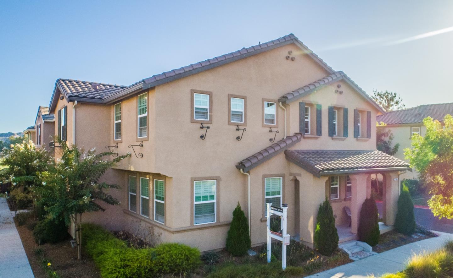 104 Caspian Way Gilroy, CA 95020 - Photo 3 of 33 a front view of a house with a porch