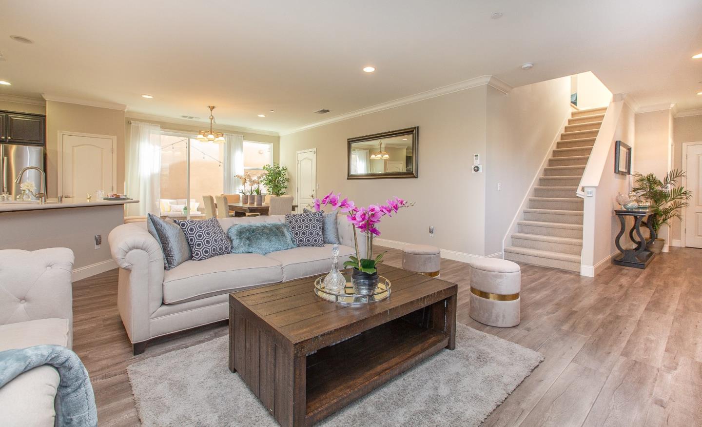 104 Caspian Way Gilroy, CA 95020 - Photo 6 of 33 a living room with furniture and wooden floor