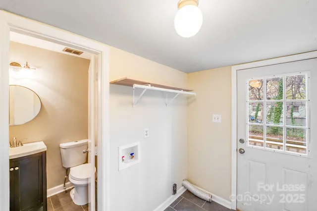 a bathroom with a sink and a shower