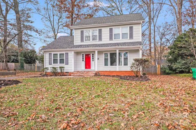 a view of a street with a building on the road