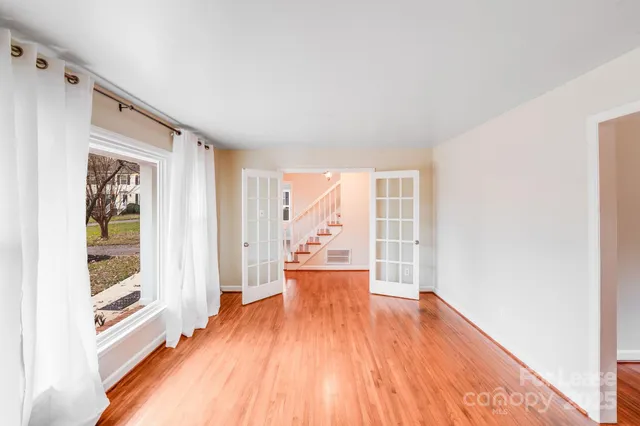 a view of an empty room and window