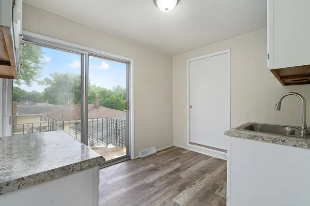 a view of a kitchen from a dining room