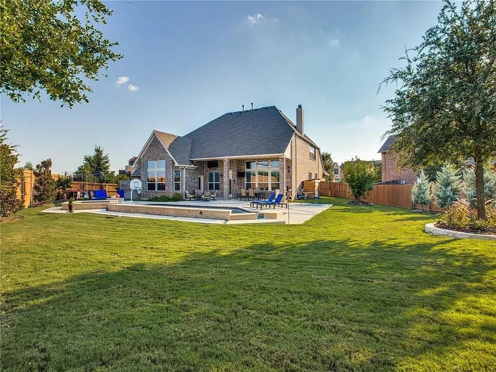 6688 Excelsior Place Frisco, TX 75035 - Photo 37 of 37 a front view of house with swimming pool having outdoor seating