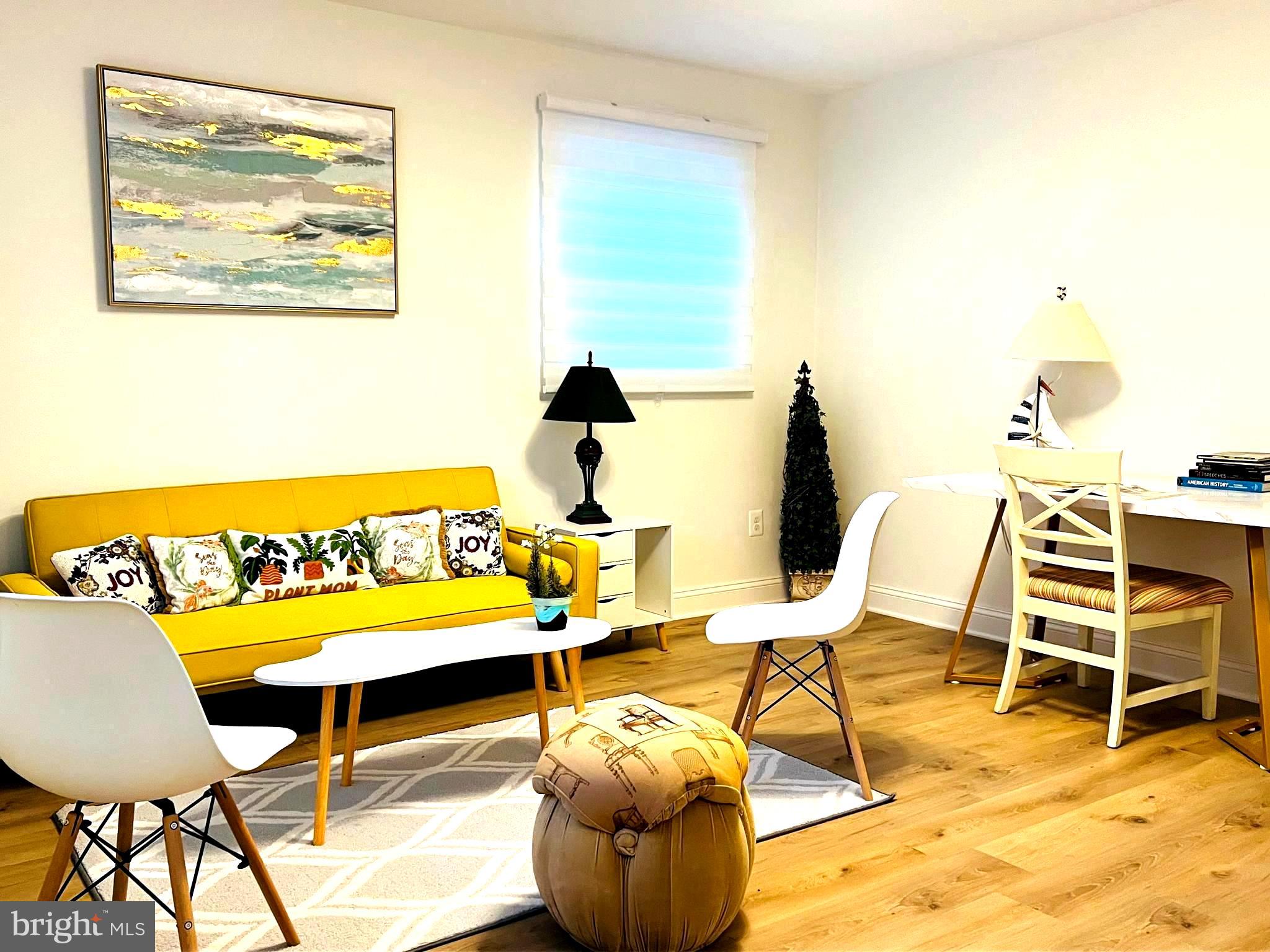 8802 2nd Avenue Silver Spring, MD 20910 - Photo 12 of 60 a balcony with chairs and table