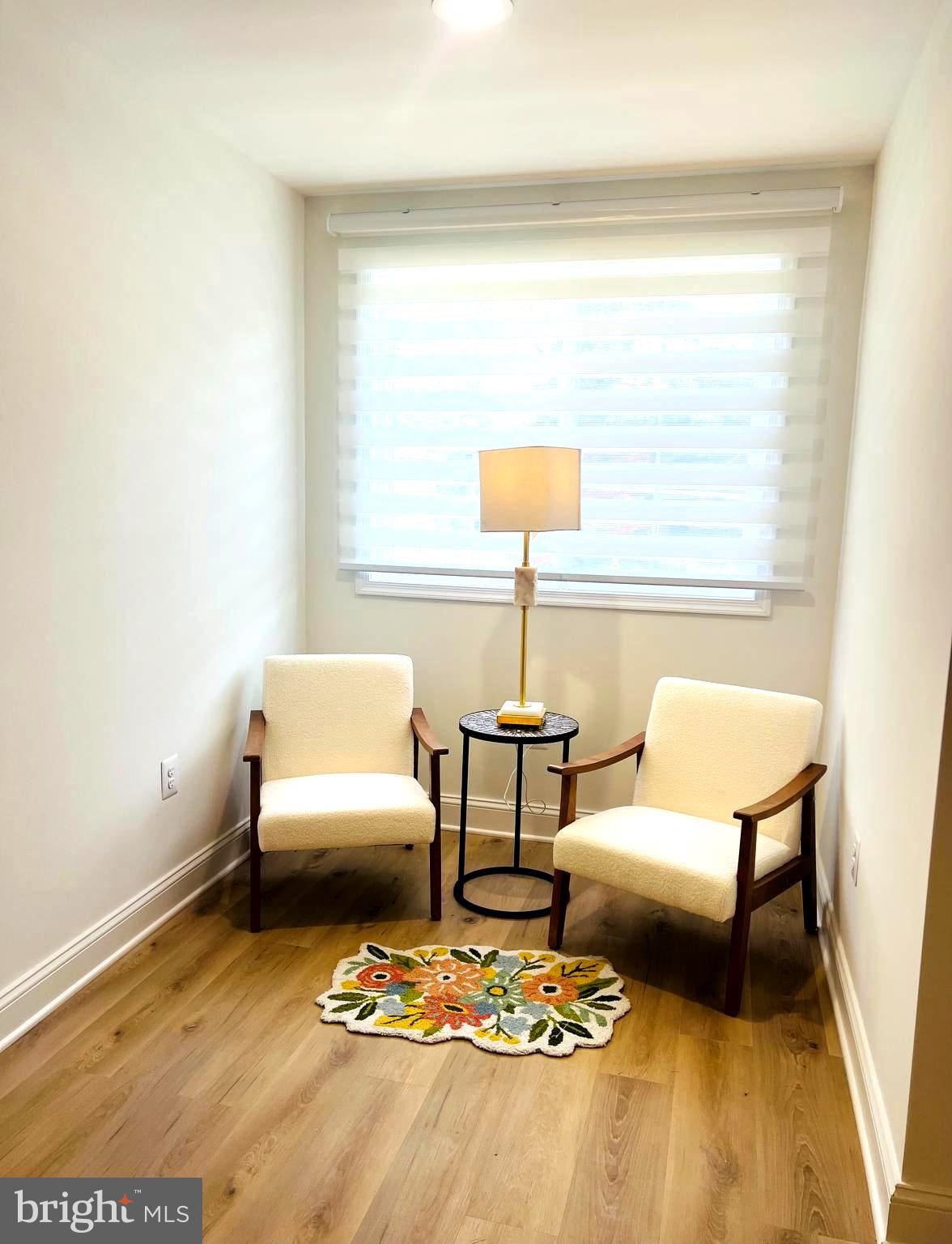 8802 2nd Avenue Silver Spring, MD 20910 - Photo 23 of 60 a living room with furniture and a table