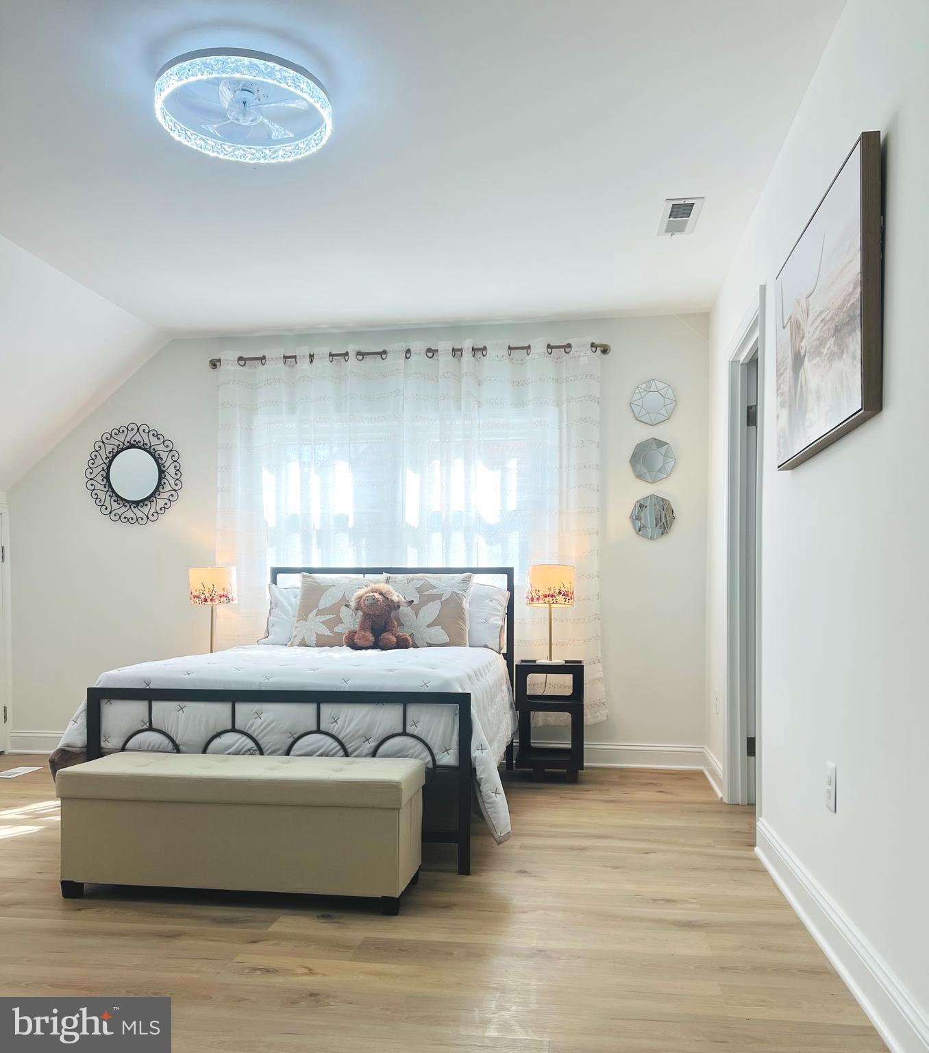 8802 2nd Avenue Silver Spring, MD 20910 - Photo 31 of 60 a living room with furniture and a window