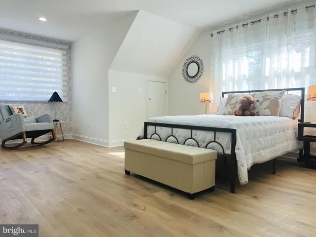 a view of room with cabinets and empty racks