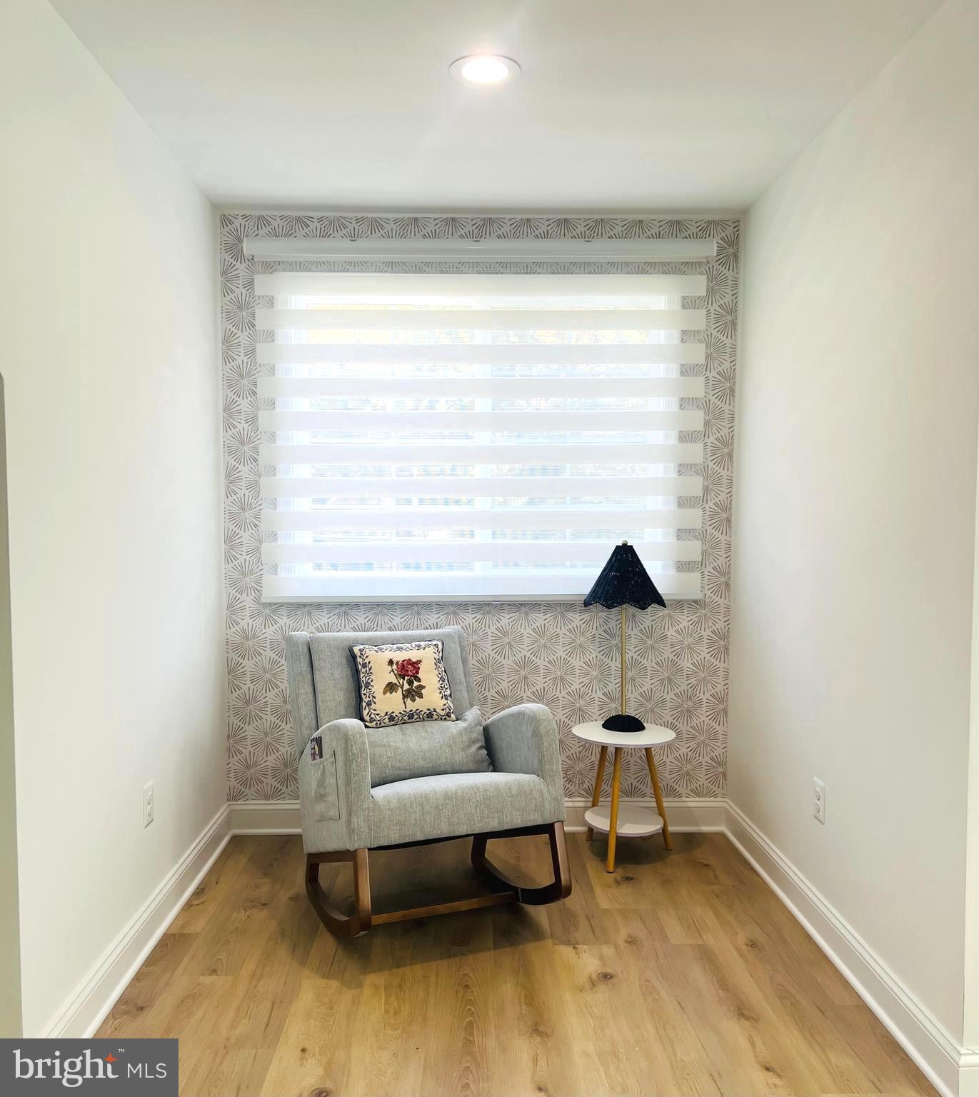 8802 2nd Avenue Silver Spring, MD 20910 - Photo 33 of 60 a living room with furniture and a window