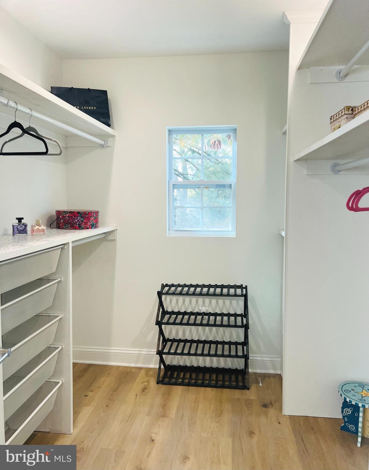 8802 2nd Avenue Silver Spring, MD 20910 - Photo 34 of 60 a view of room with cabinets and empty racks