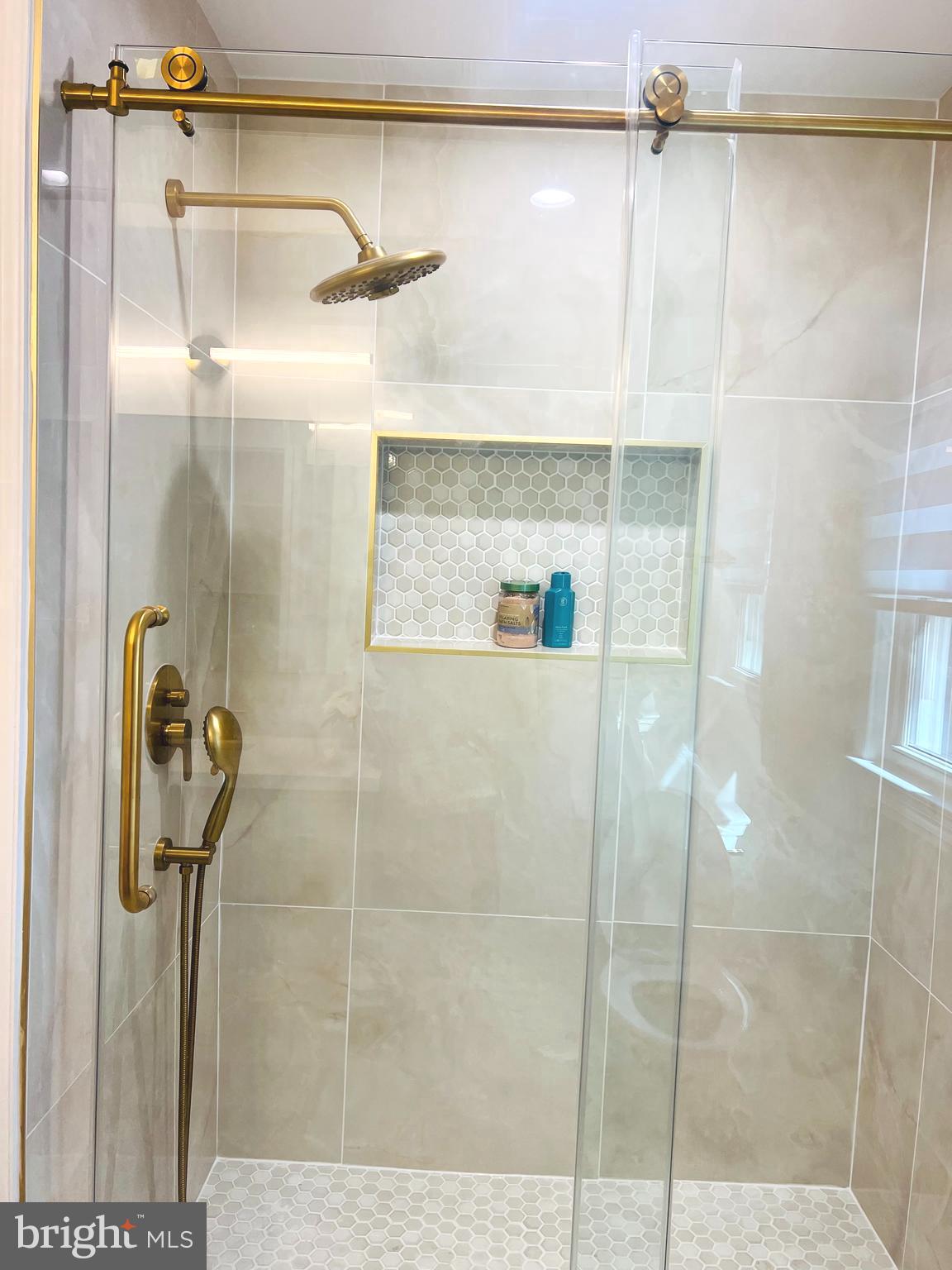 8802 2nd Avenue Silver Spring, MD 20910 - Photo 37 of 60 a bathroom with a shower