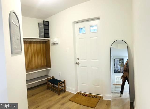 8802 2nd Avenue Silver Spring, MD 20910 - Photo 40 of 60 a view of livingroom with furniture and wooden floor