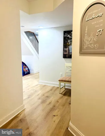 a bathroom with a sink a mirror and vanity